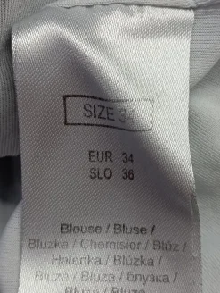 Kurzarm-Bluse                            Größe                34