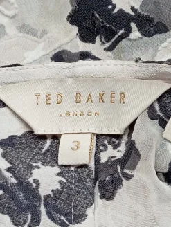 Schlupf-Bluse                            Größe                38