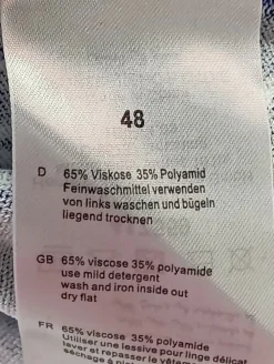 Schlupf-Bluse                            Größe                48