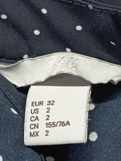 Stehkragenbluse                            Größe                32